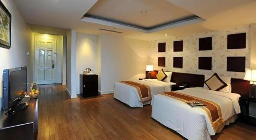 Bed in Cosiana Hotel