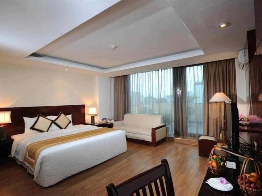 Bed in Cosiana Hotel