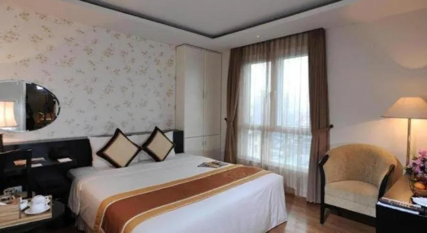 Bed in Cosiana Hotel