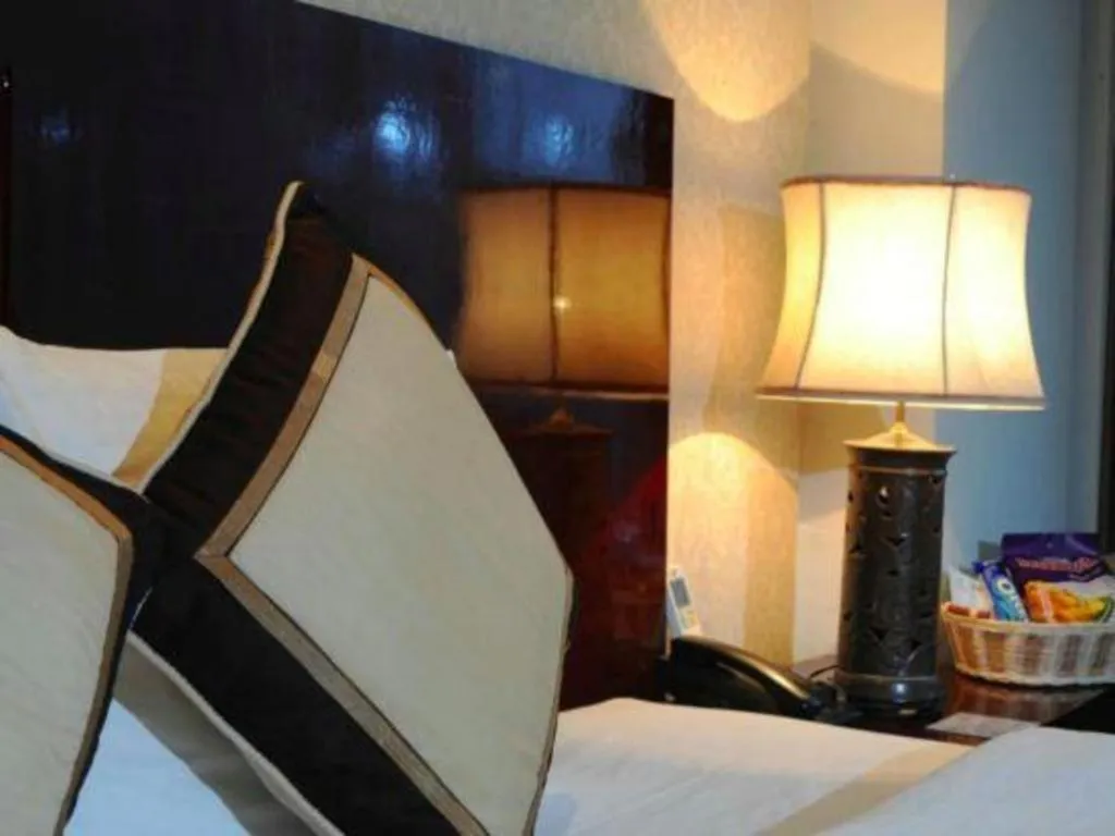 Bed in Cosiana Hotel