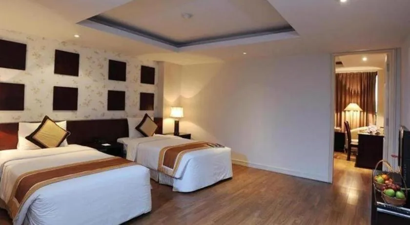 Bed in Cosiana Hotel