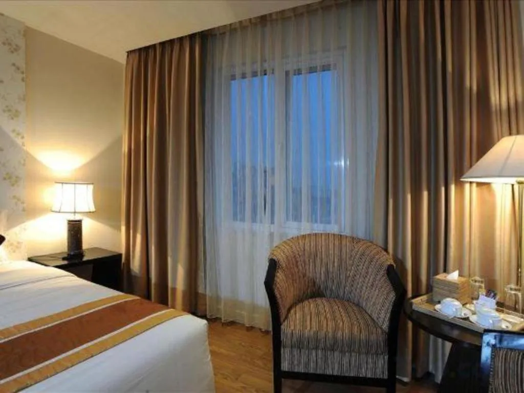 Bed in Cosiana Hotel