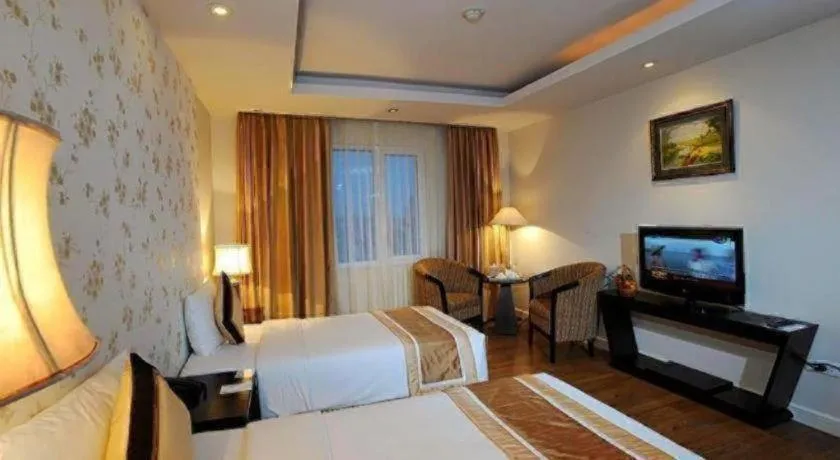 Bed in Cosiana Hotel