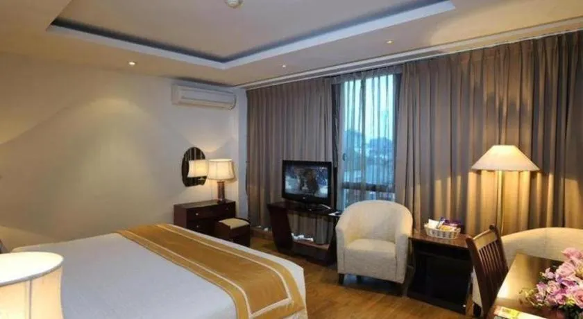 Bed in Cosiana Hotel