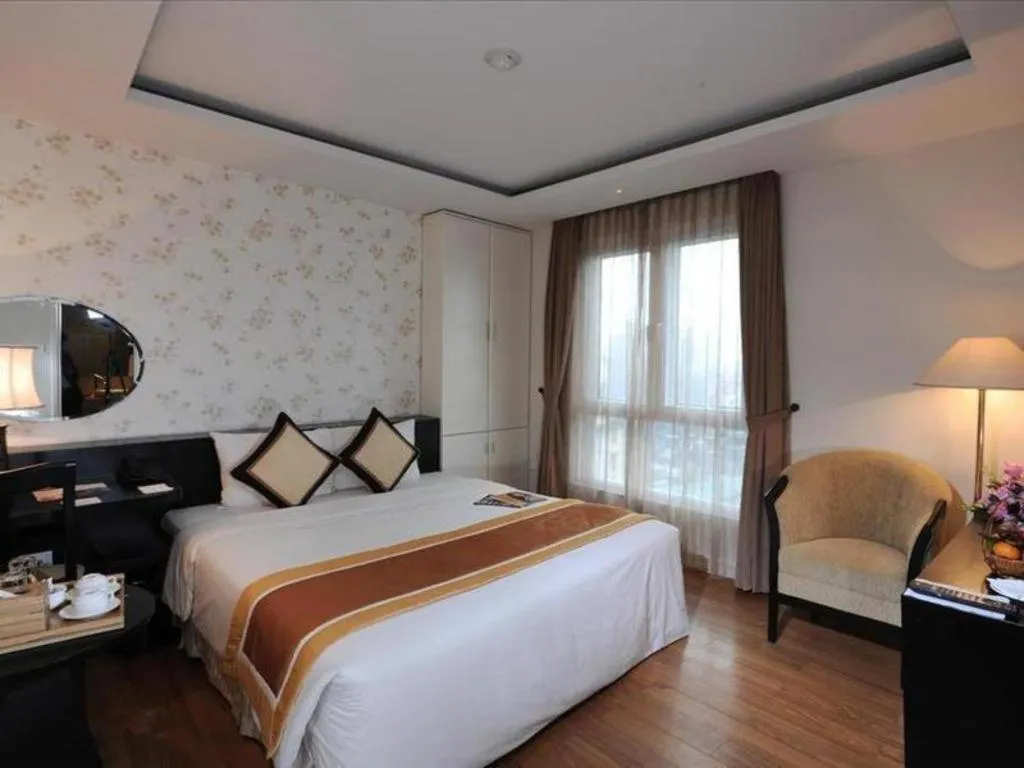 Bed in Cosiana Hotel