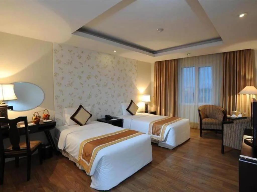 Bed in Cosiana Hotel