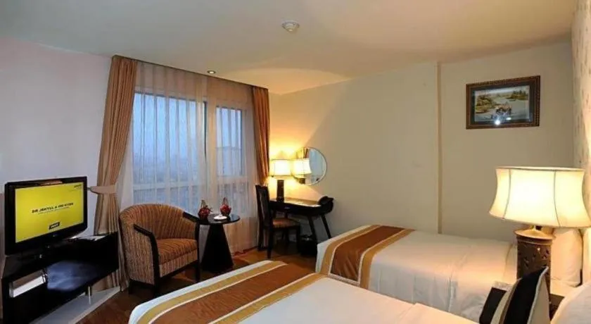 Bed in Cosiana Hotel