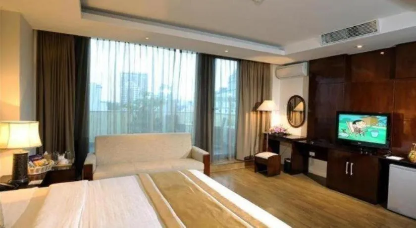 Bed in Cosiana Hotel