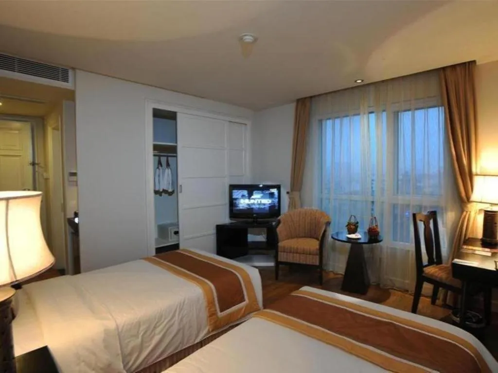 Bed in Cosiana Hotel