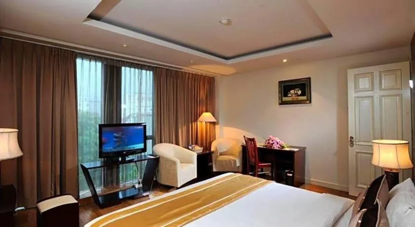 Bed in Cosiana Hotel