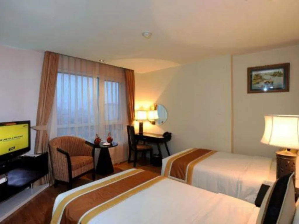 Bed in Cosiana Hotel