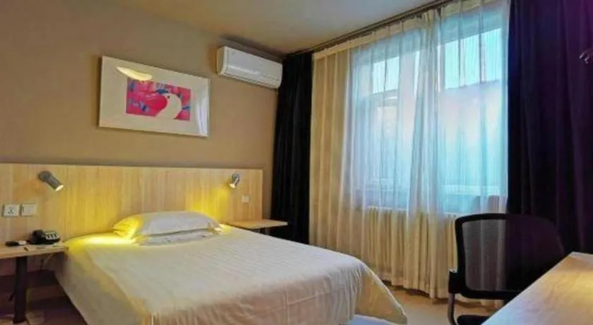 Bed in Jinjiang Inn Jinan Daming Lake