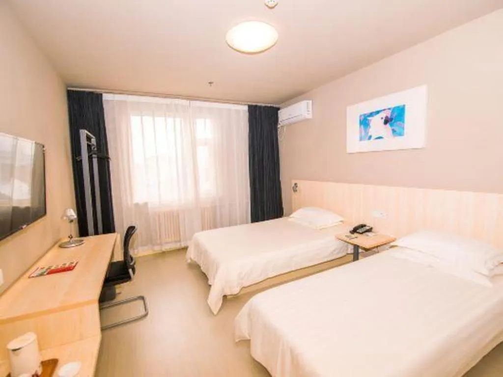 Bed in Jinjiang Inn Jinan Daming Lake