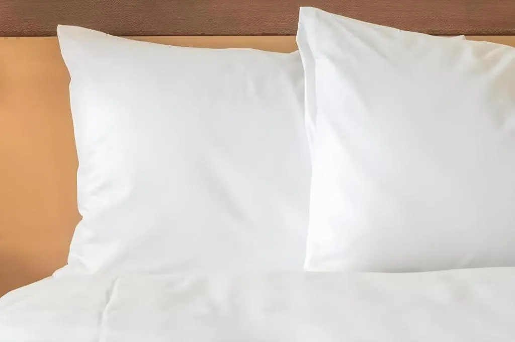 Bed in Madani Hotel Medan