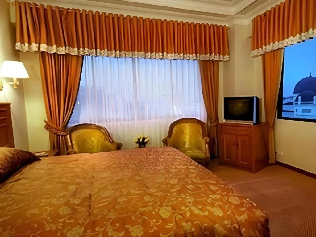 Bed in Madani Hotel Medan