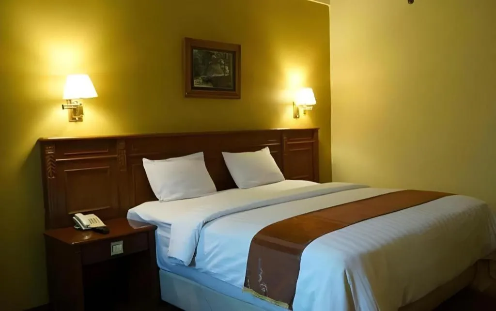 Bed in Madani Hotel Medan