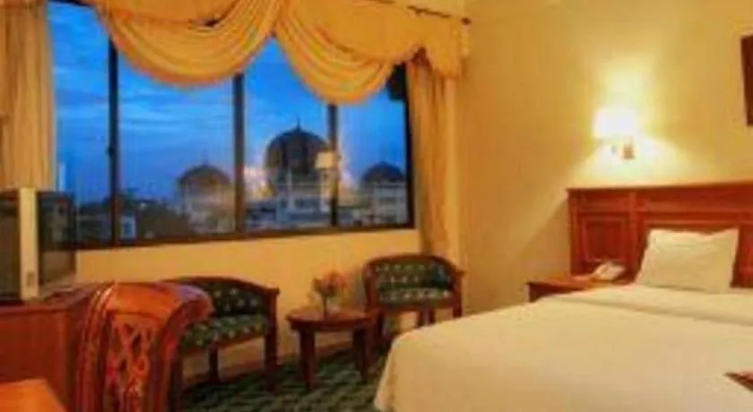Bed in Madani Hotel Medan