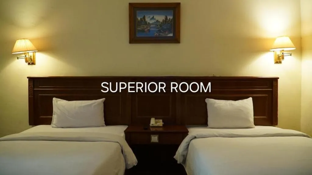 Bed in Madani Hotel Medan