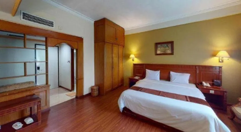 Bed in Madani Hotel Medan