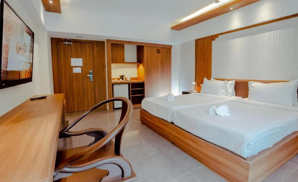 Bed in Bonito Chinos Hotel