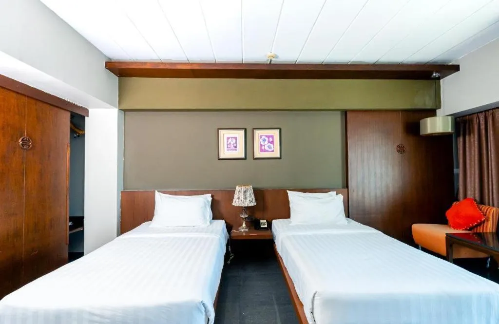 Bed in Bonito Chinos Hotel