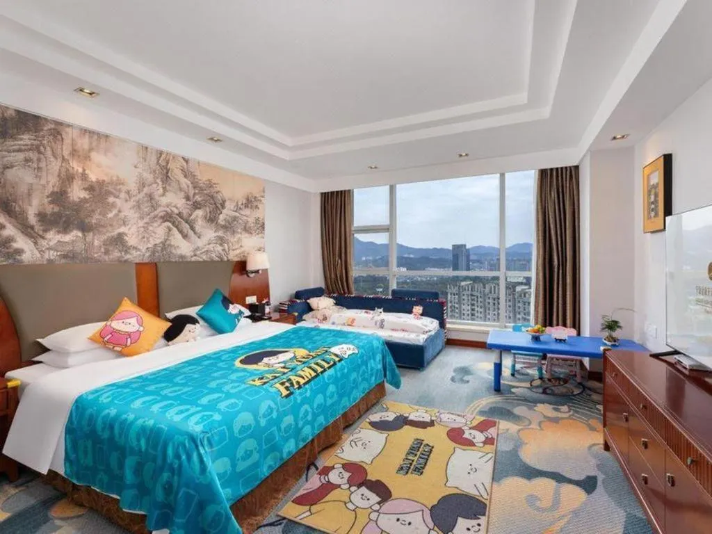 Bed in New Century Grand Hotel Ninghai Jinhai