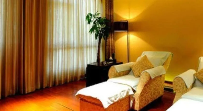 Bed in New Century Grand Hotel Ninghai Jinhai