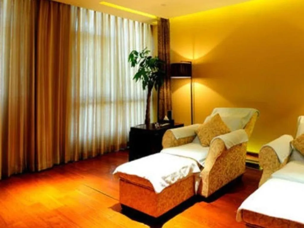 Bed in New Century Grand Hotel Ninghai Jinhai