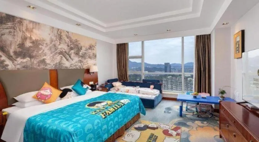 Bed in New Century Grand Hotel Ninghai Jinhai