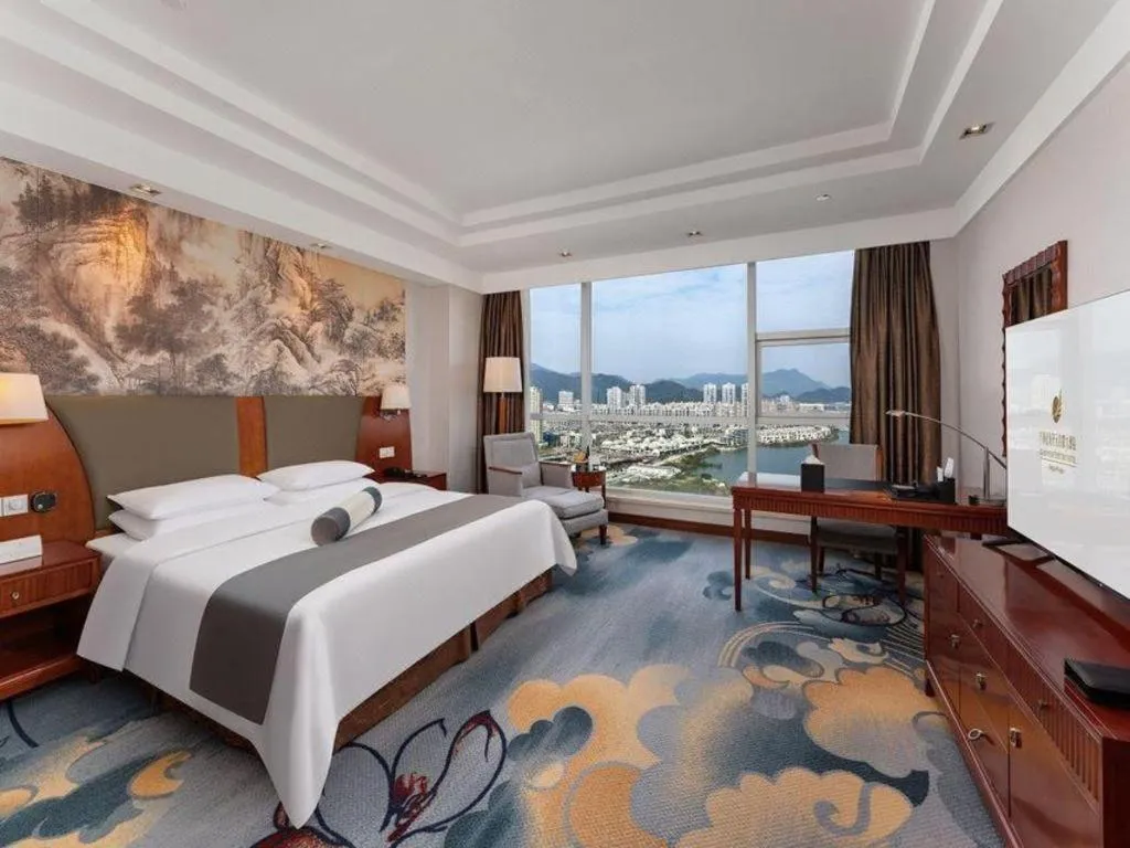Bed in New Century Grand Hotel Ninghai Jinhai