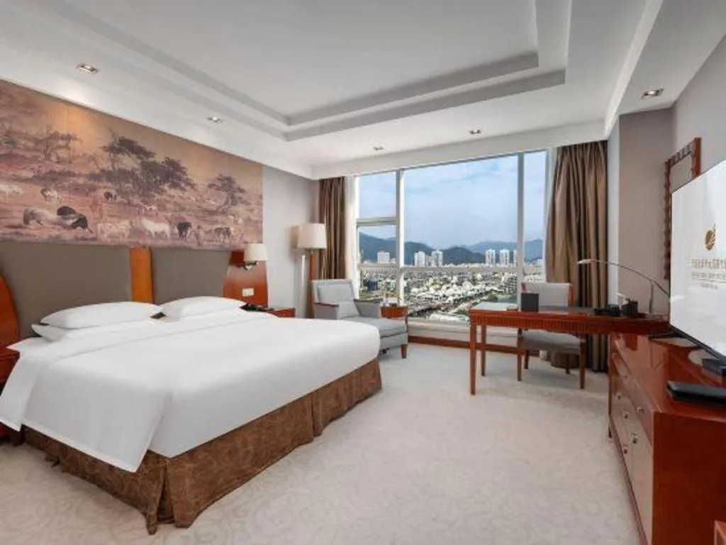 Bed in New Century Grand Hotel Ninghai Jinhai