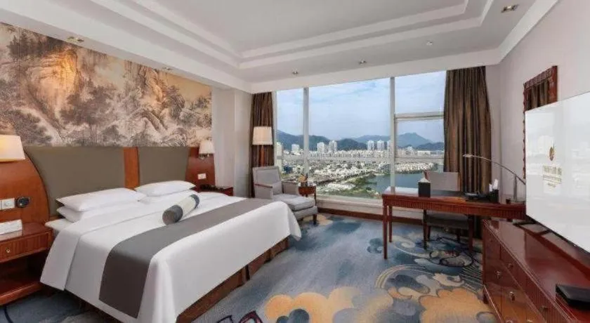 Bed in New Century Grand Hotel Ninghai Jinhai