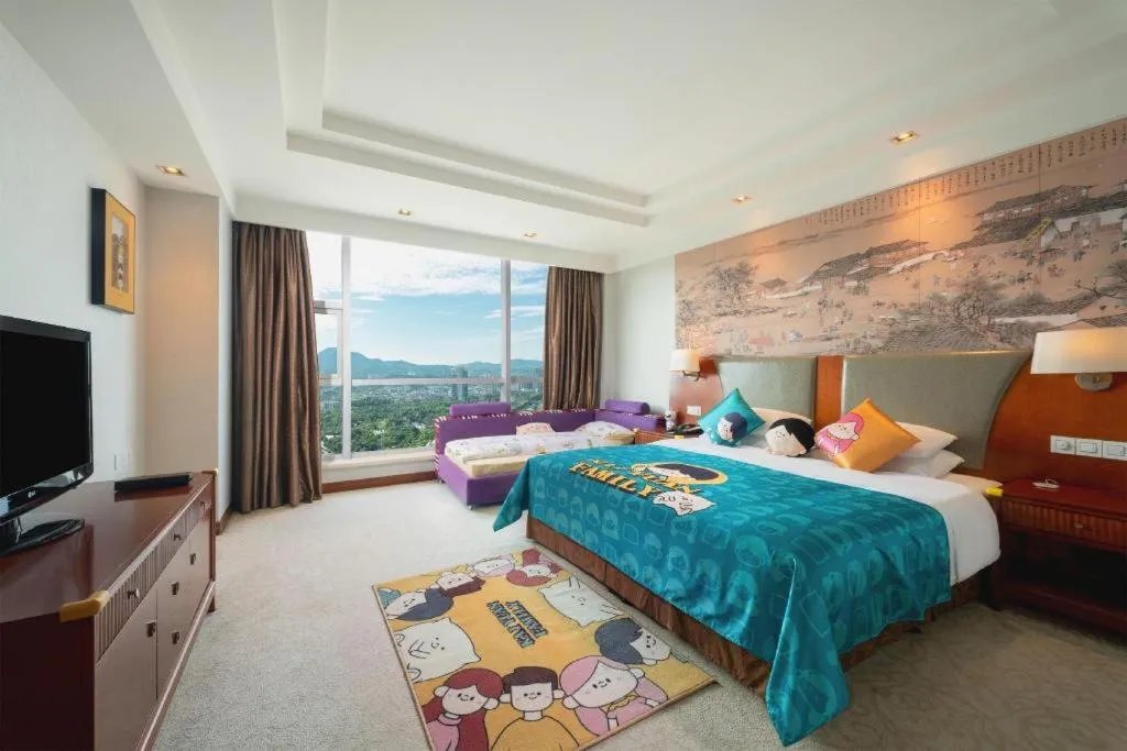 Bed in New Century Grand Hotel Ninghai Jinhai