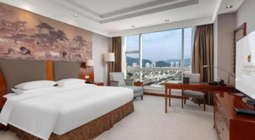 Bed in New Century Grand Hotel Ninghai Jinhai