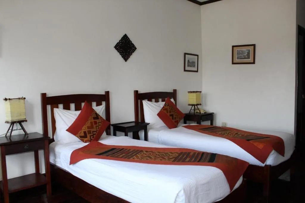 Bed in Residence Sisouk Boutique Hotel