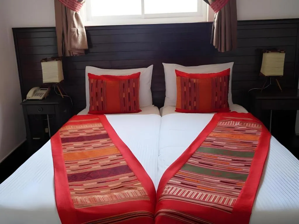 Bed in Residence Sisouk Boutique Hotel