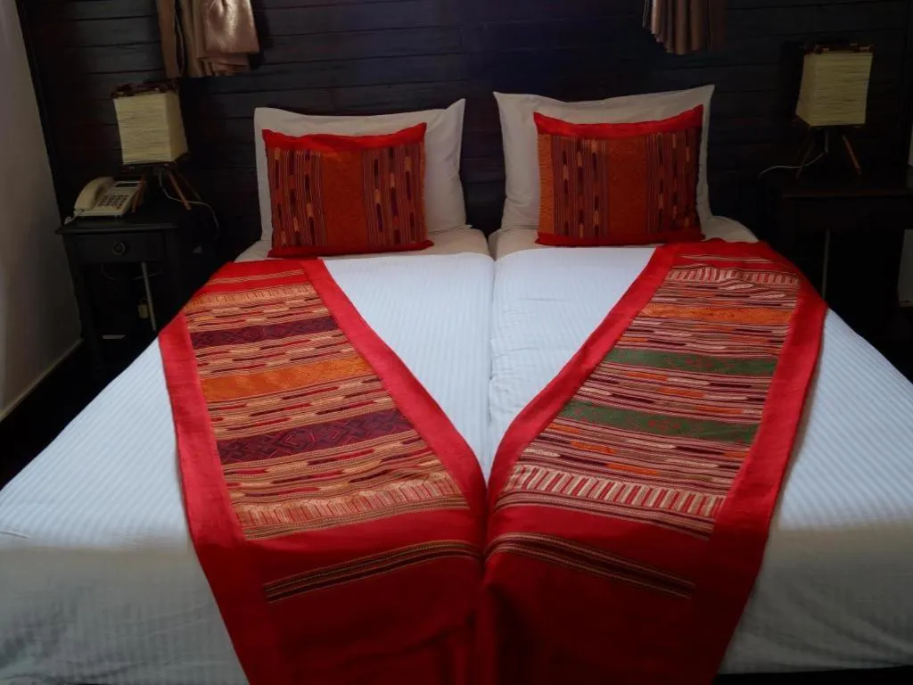 Bed in Residence Sisouk Boutique Hotel