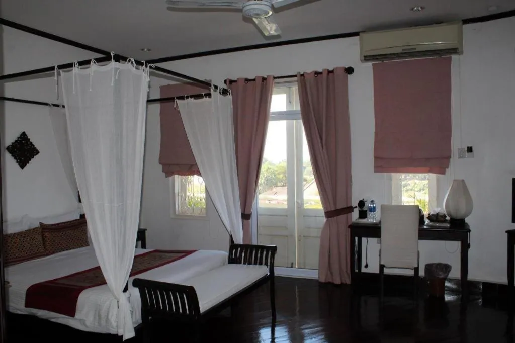 Bed in Residence Sisouk Boutique Hotel