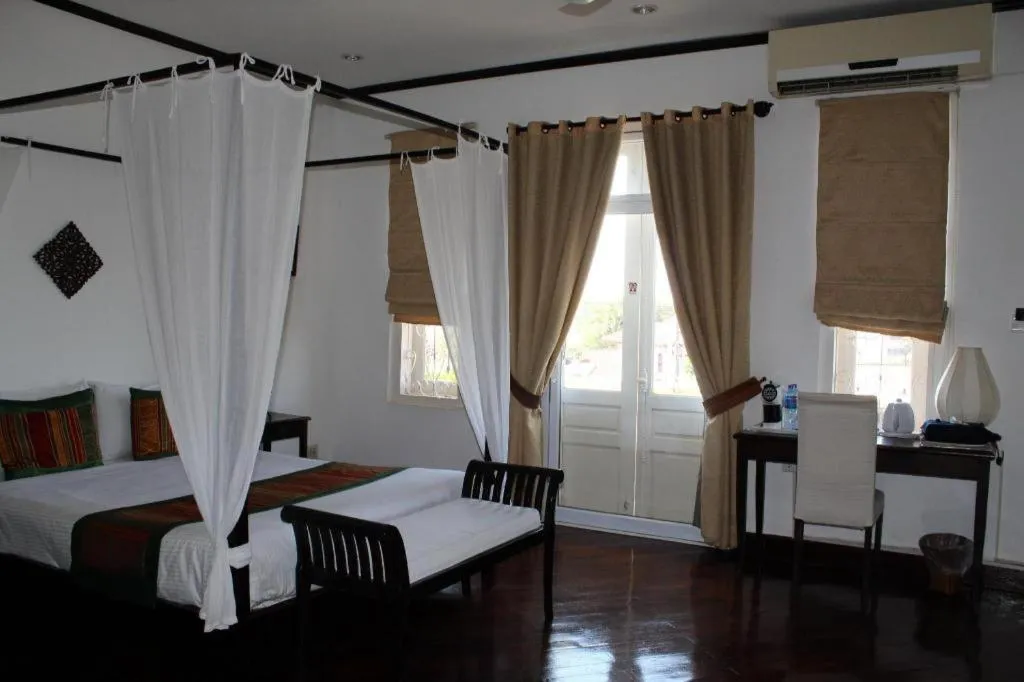 Bed in Residence Sisouk Boutique Hotel