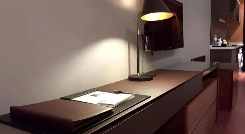 Bed in Grand Madison Qingdao Harbour-view Central（Former Qingdao Farglory Hotel）