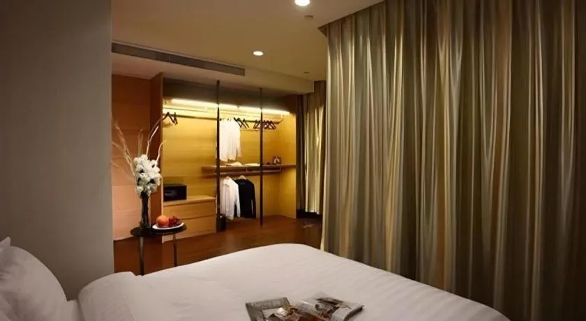 Bed in Grand Madison Qingdao Harbour-view Central（Former Qingdao Farglory Hotel）