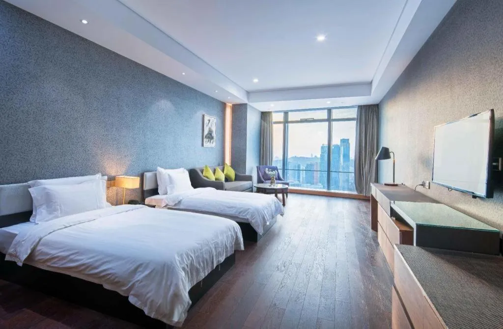 Bed in Grand Madison Qingdao Harbour-view Central（Former Qingdao Farglory Hotel）