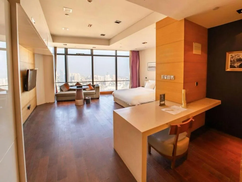 Bed in Grand Madison Qingdao Harbour-view Central（Former Qingdao Farglory Hotel）