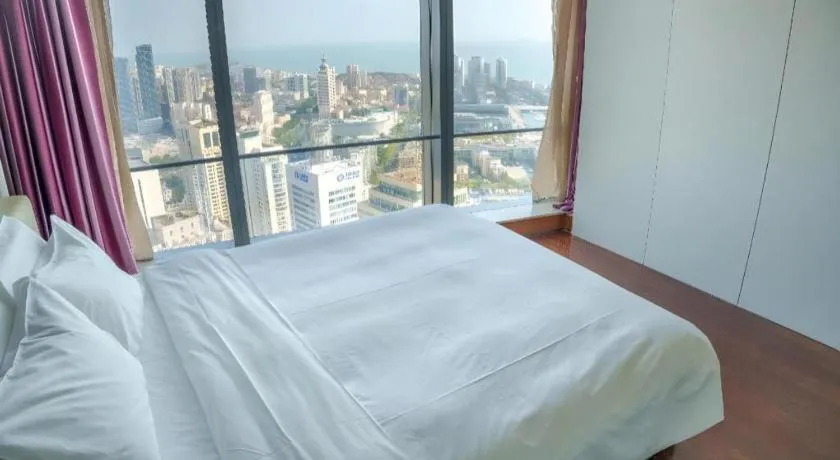 Bed in Grand Madison Qingdao Harbour-view Central（Former Qingdao Farglory Hotel）