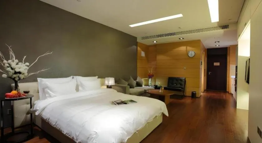 Bed in Grand Madison Qingdao Harbour-view Central（Former Qingdao Farglory Hotel）