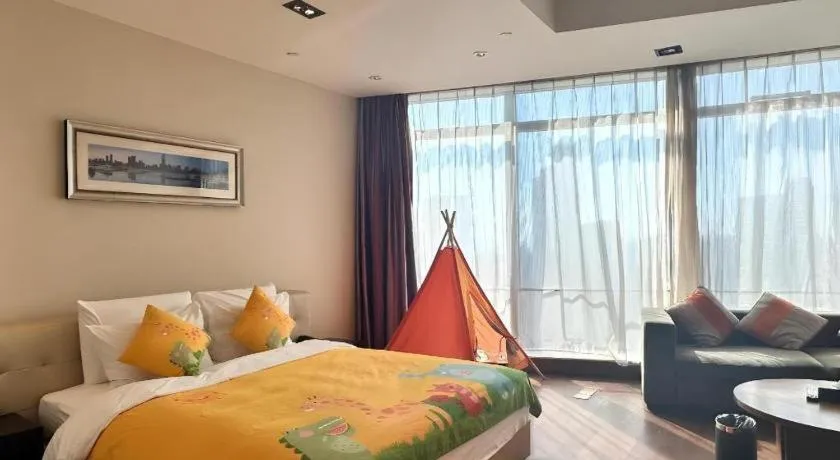 Bed in Grand Madison Qingdao Harbour-view Central（Former Qingdao Farglory Hotel）