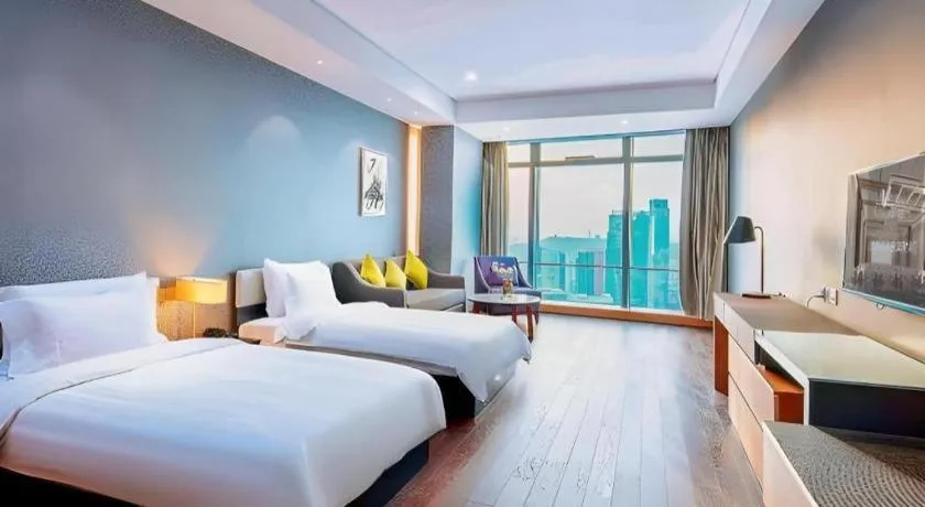 Bed in Grand Madison Qingdao Harbour-view Central（Former Qingdao Farglory Hotel）