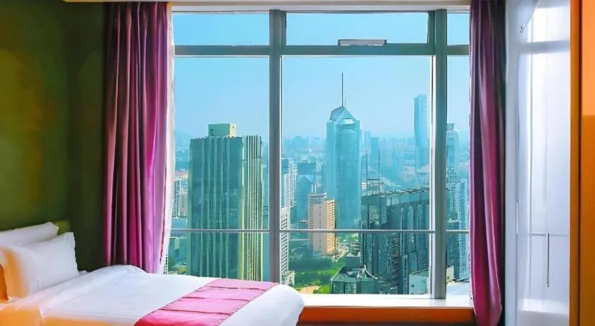 Bed in Grand Madison Qingdao Harbour-view Central（Former Qingdao Farglory Hotel）