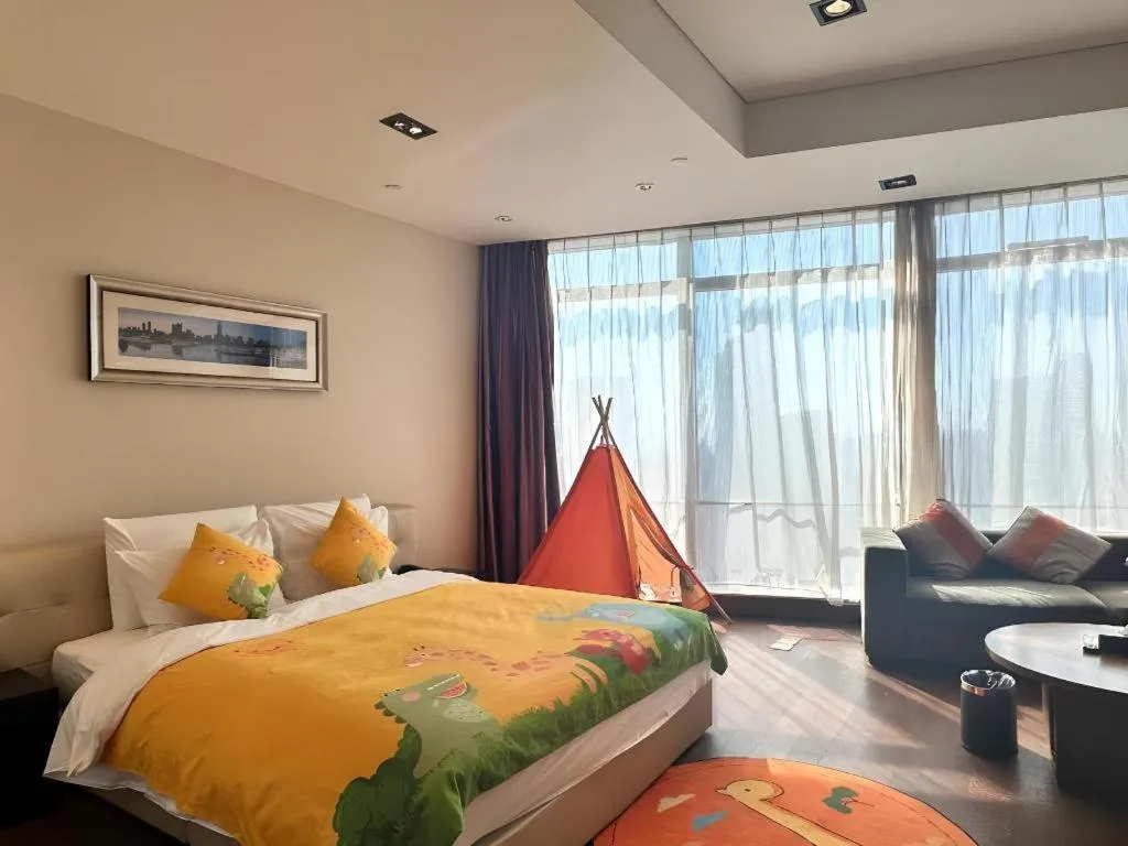 Bed in Grand Madison Qingdao Harbour-view Central（Former Qingdao Farglory Hotel）