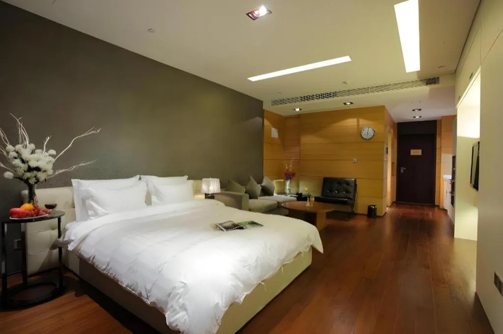 Bed in Grand Madison Qingdao Harbour-view Central（Former Qingdao Farglory Hotel）